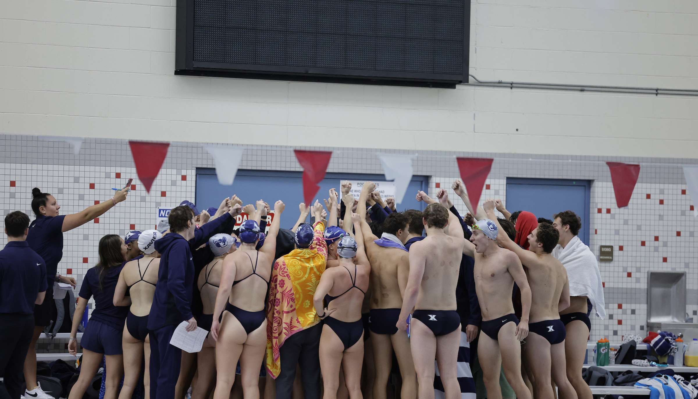 Read Swimming at Butler Double Dual by Xavier Musketeers