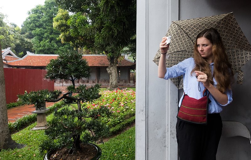 Eryn Hunt takes photos at the Temple of Literature in Hanoi. Photo by Jaren Wilkey/BYU