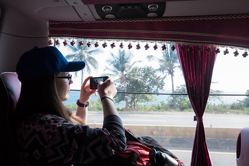 Lizzy Newbill photographs the ocean after arriving in the Dominican Republic. Photo by Jaren Wilkey/BYU