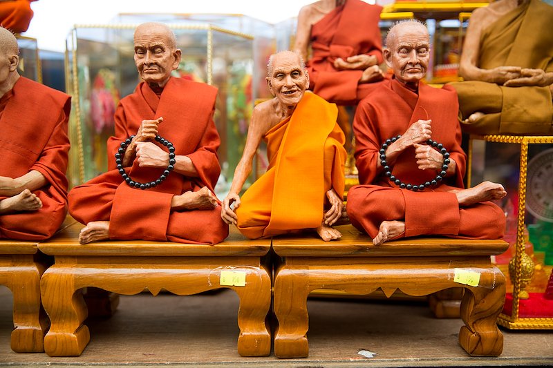 Realistic miniature monks for sale outside Wat Ratchanaddaram.