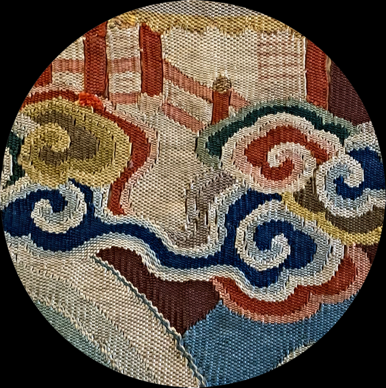 Close-up of woven Japanese textile sample, depicting swirling clouds in ...