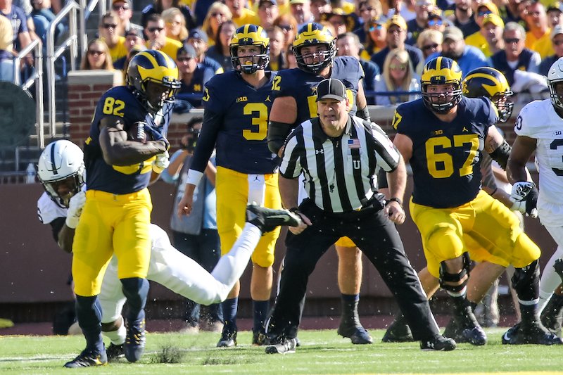 Wilton Speight watches as Amara Darboh picks up yards after the catch.