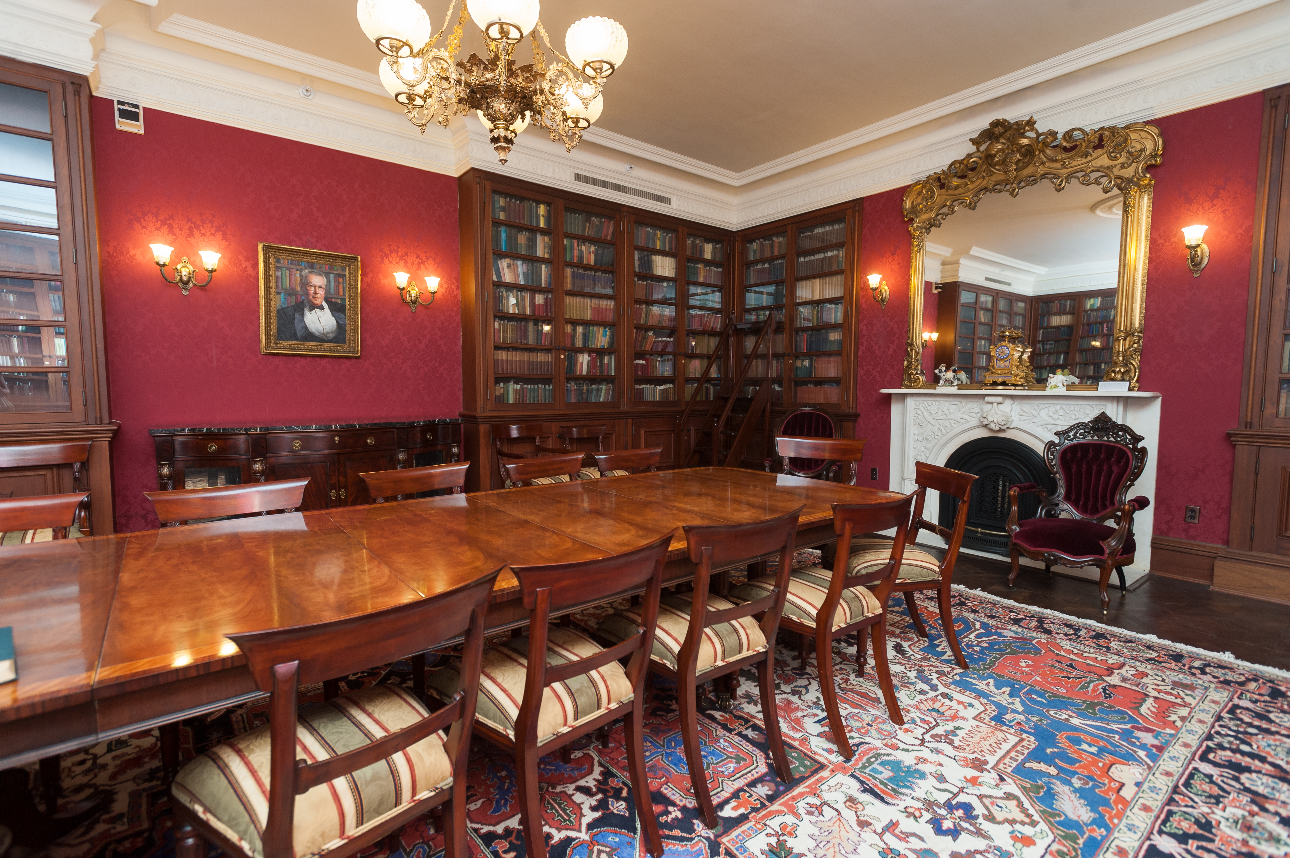The Cabell Room includes a long table and glass-windowed bookcases ...