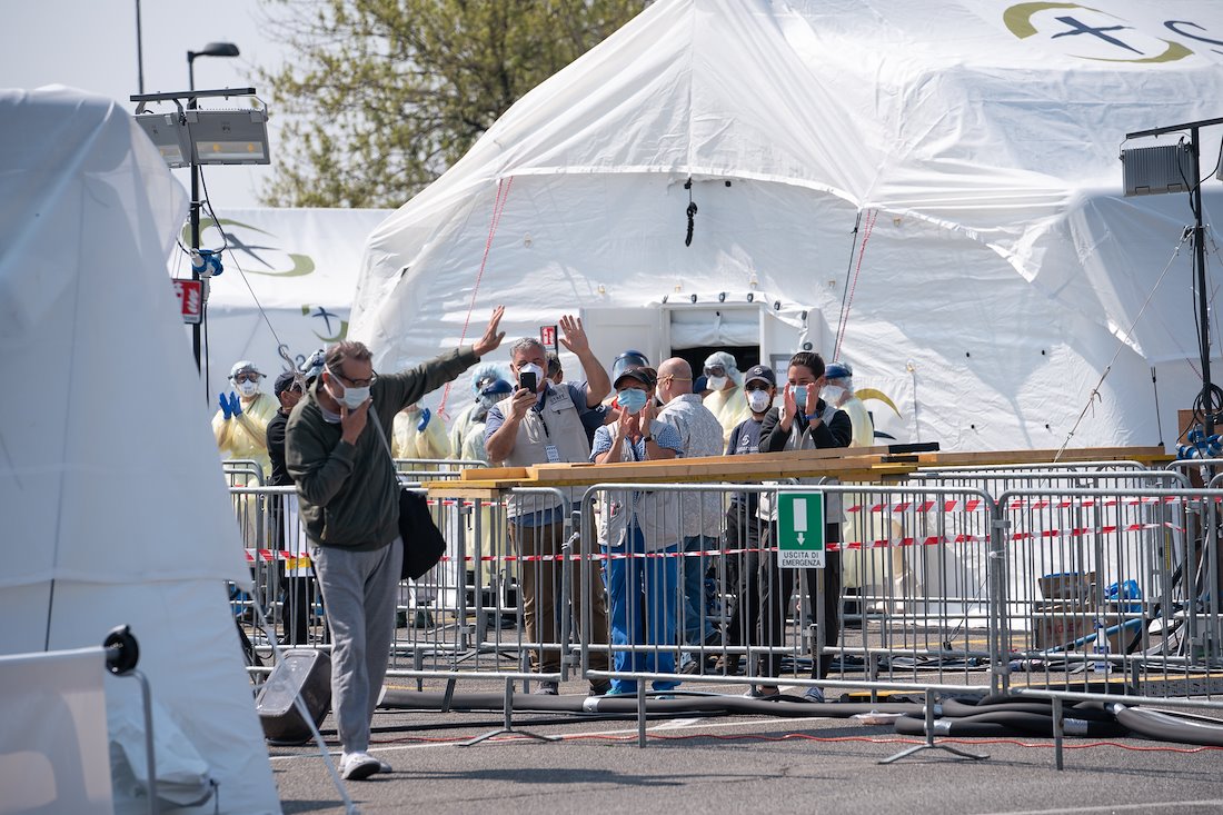 Francesco waves to his well-wishers as he is discharged. "I couldn't imagine so many people praying for me," he said, "for all this love around me."