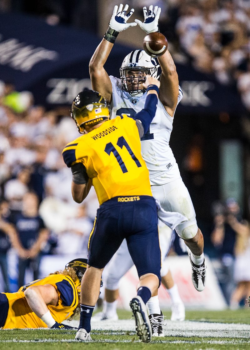 Harvey Langi blocks a pass during the game against Toledo - Photo by Aaron Cornia/BYU