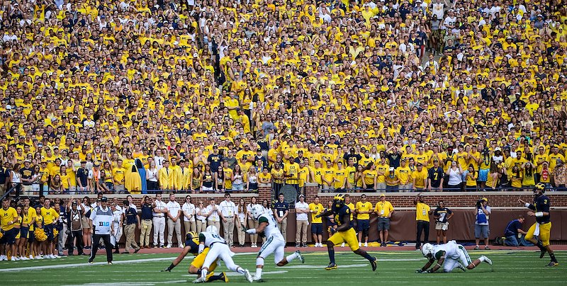 On Michigan's first play from scrimmage, quarterback Wilton Speight shocks the 110,000+ fans by throwing an interception.