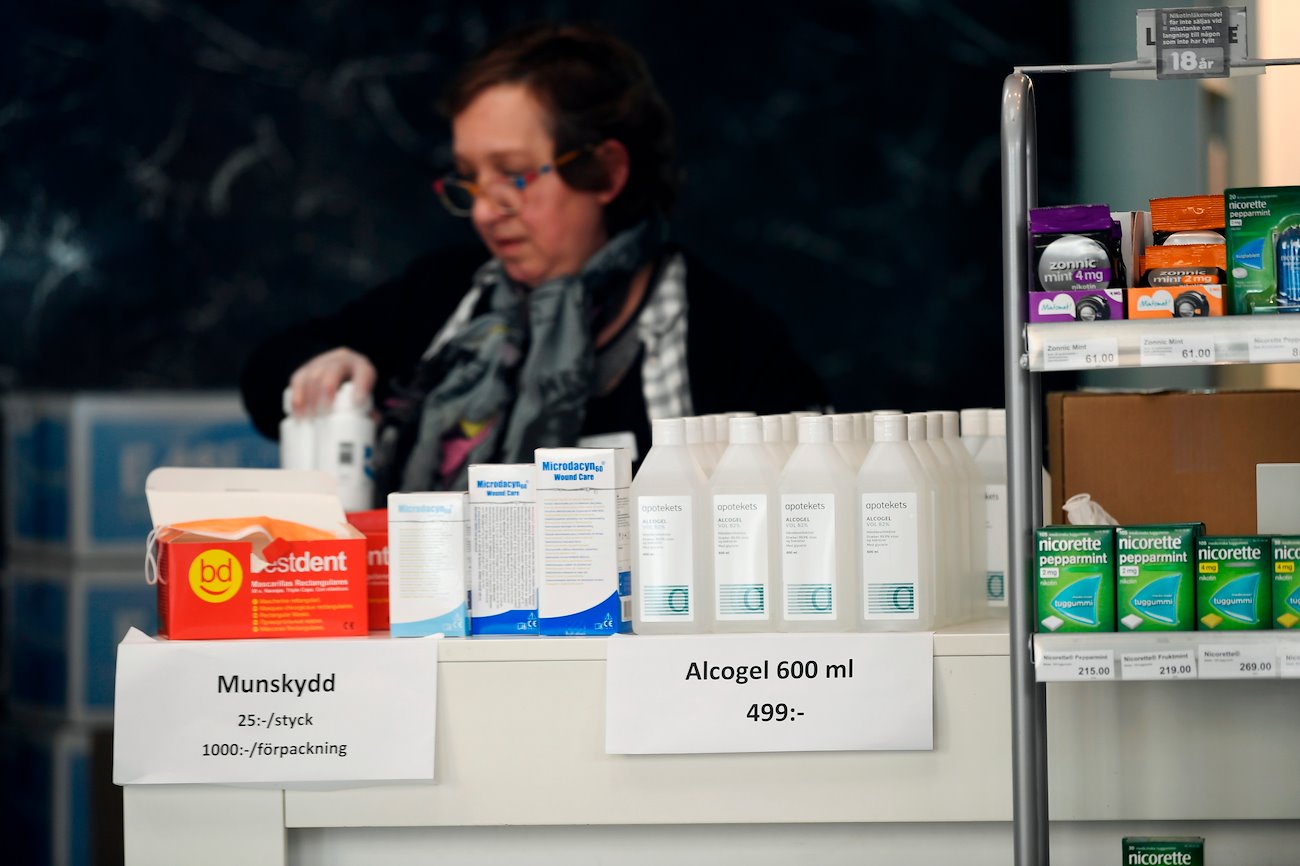 Protective masks and alcohol gel sit for sale in a pharmacists in Stockholm, Sweden, on Thursday, March 26, 2020.