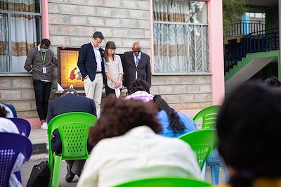 The CURE family prays for Dr. Rick and Anna as they prepare to move.