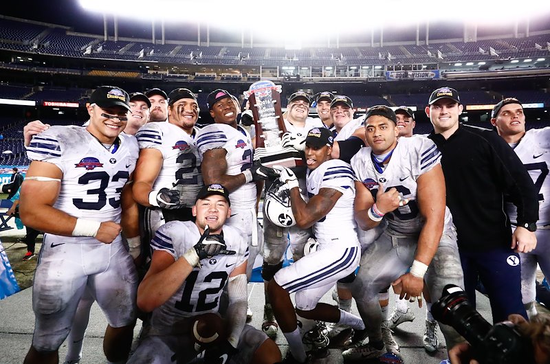 The BYU seniors celebrate their 24-21 win over Wyoming in the Poinsettia Bowl - Photo by Jaren Wilkey/BYU
