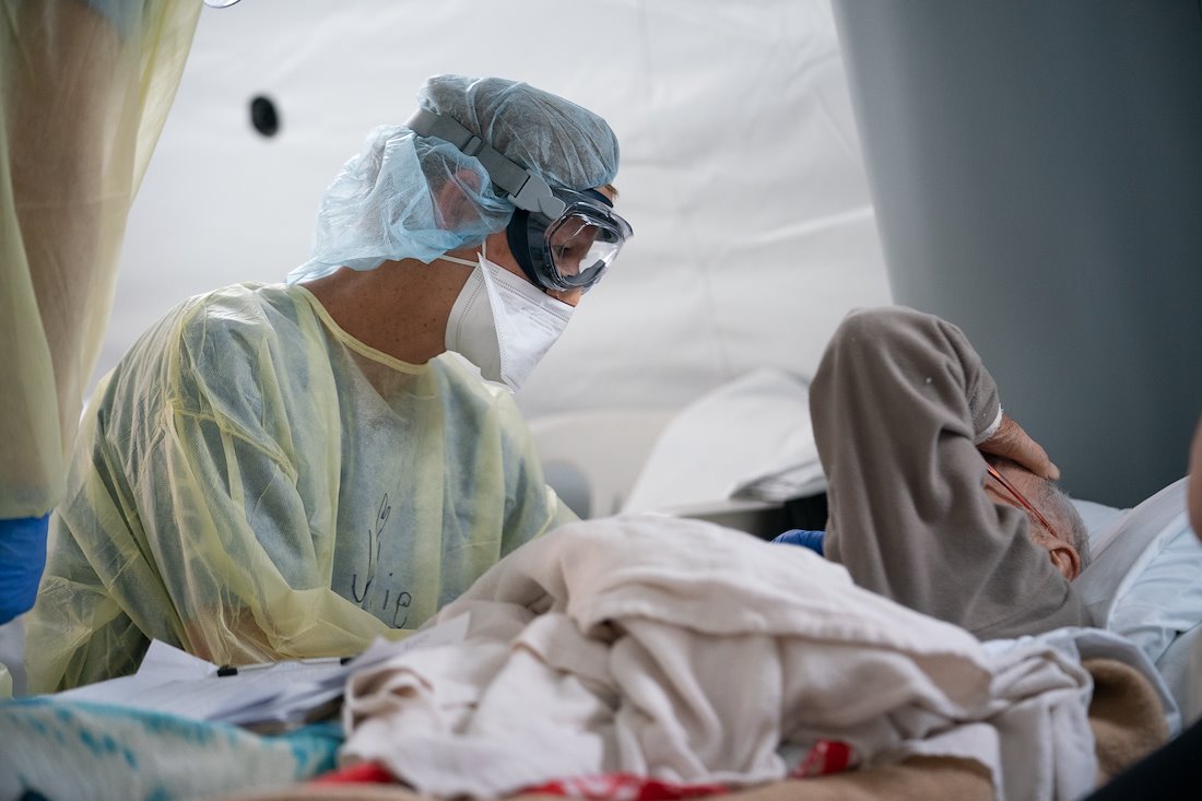 "I want to see my grandson, and I want to see you, too," this patient at the field hospital in Cremona told his doctor, Julie.