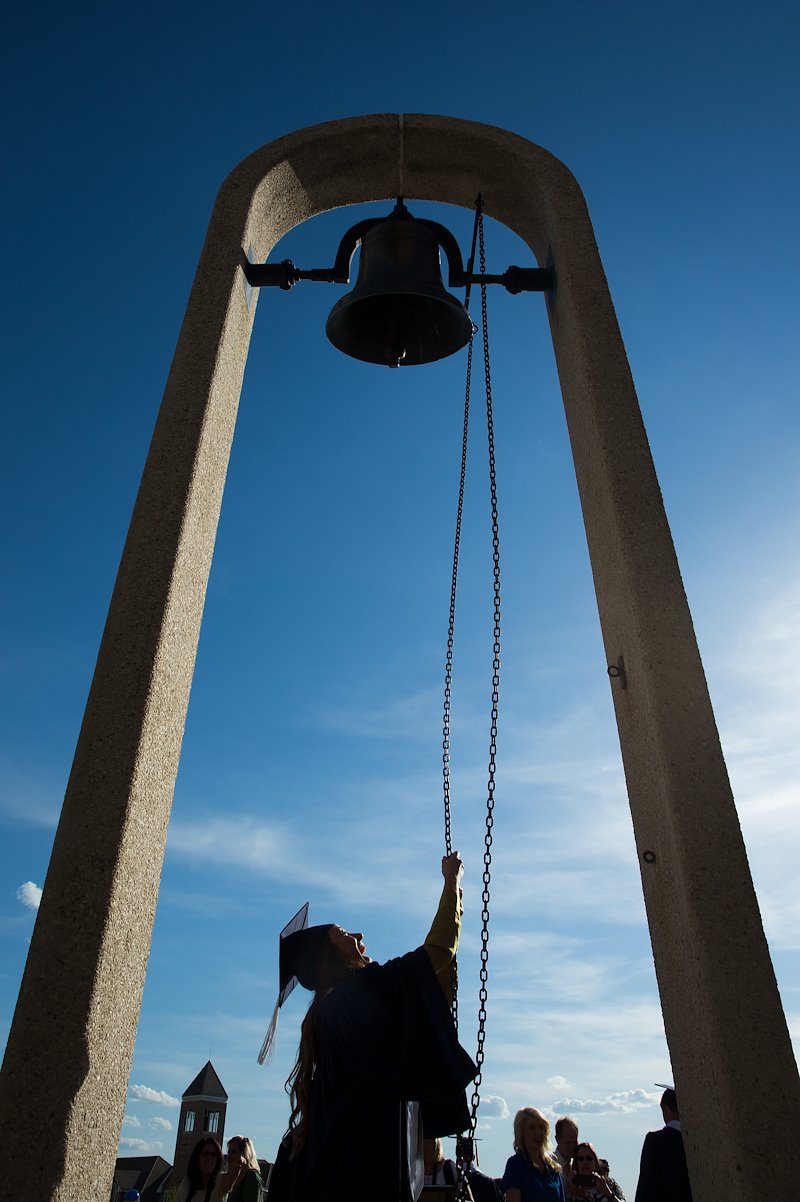 Student ringing the victory bell at the Spring Commencement Exercises - Photo by Jaren Wilkey/BYU