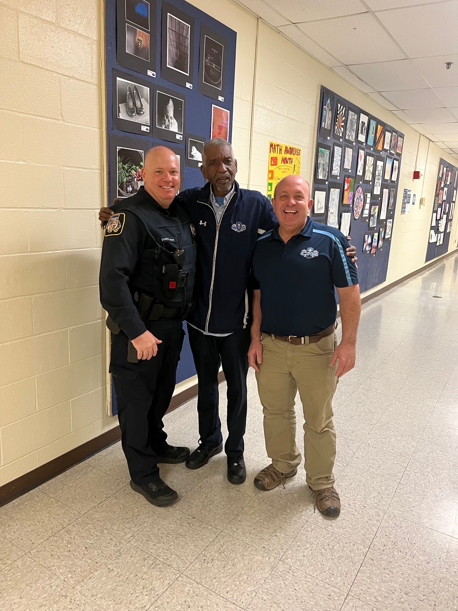 Officer Stanley, Coach Tully, and technology education teacher Gregory ...
