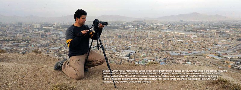Jawad, taking a photograph of Kabul from a distance.