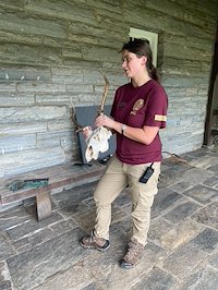 McCullough Fellow Phoebe Carnes educates students about elk.