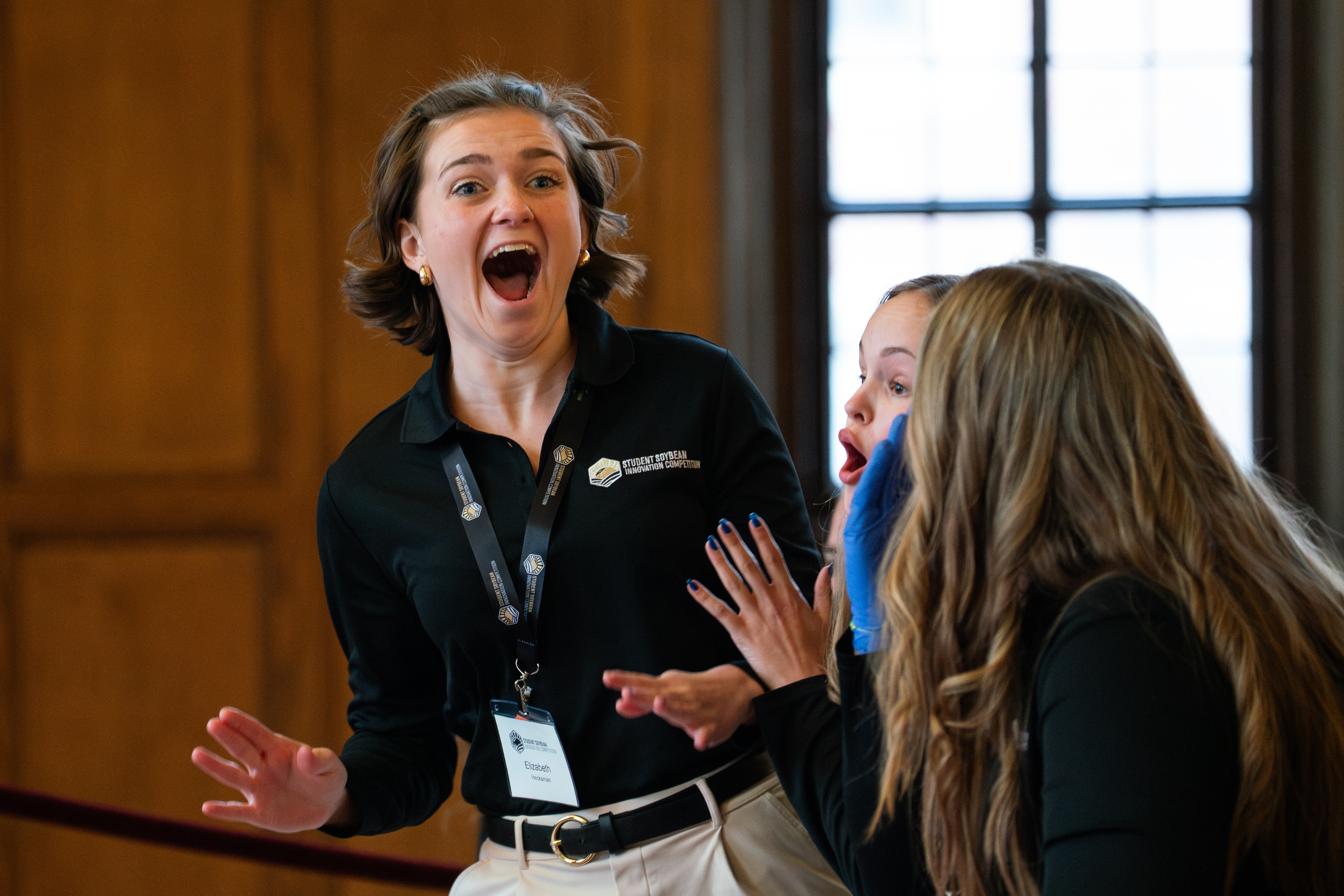 Team Soy Seal reacts with surprise at the Student Soybean Innovation ...