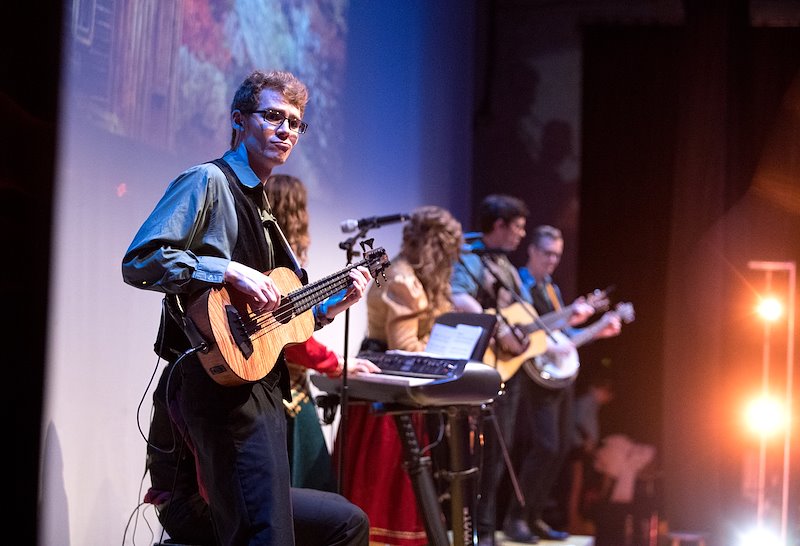 Matthew Baird and the Mountain Strings play during a concert at the Vietnam Dance Academy. Photo by Jaren Wilkey/BYU
