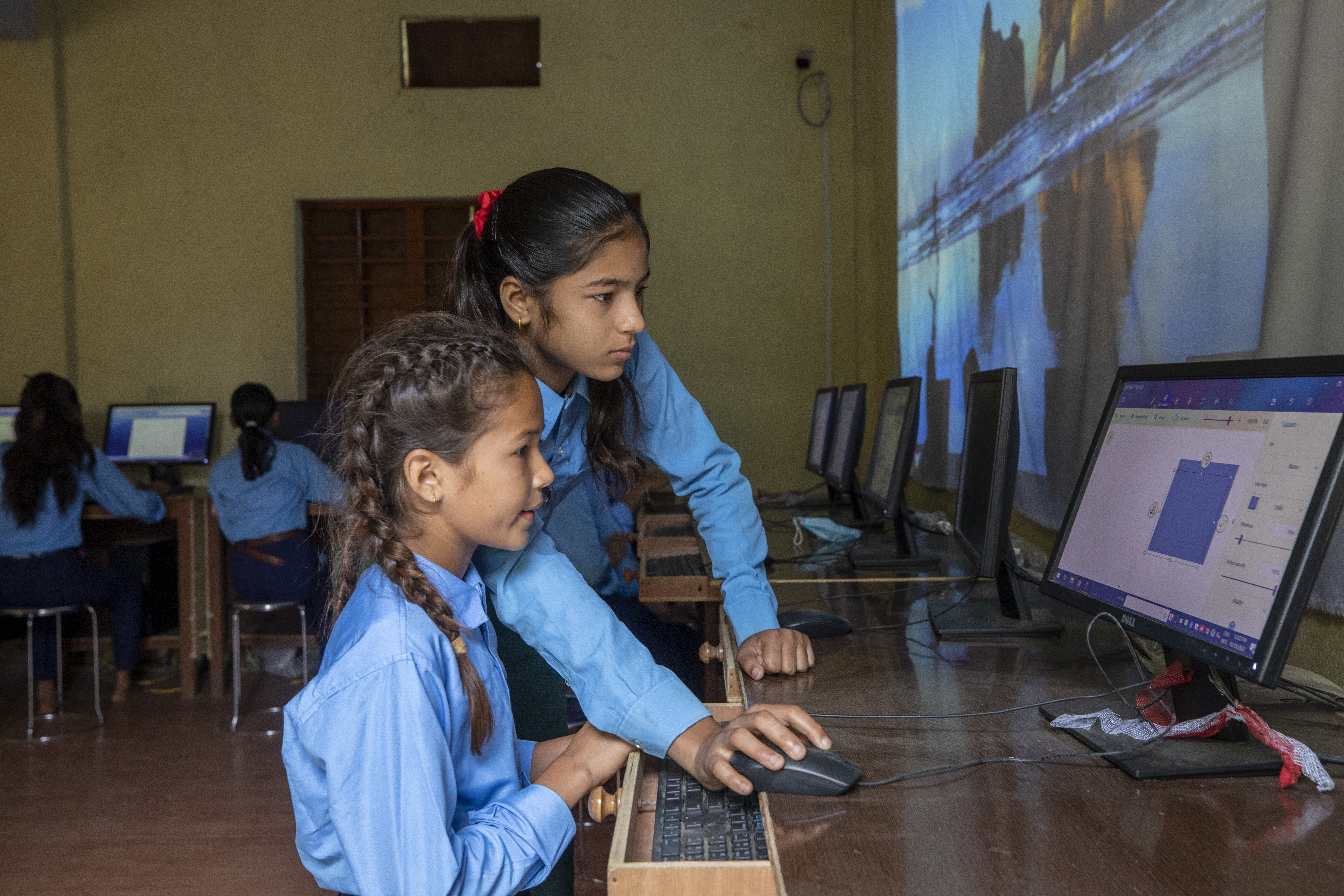 Students attend their computer class at Shree Rastriya secondary school ...