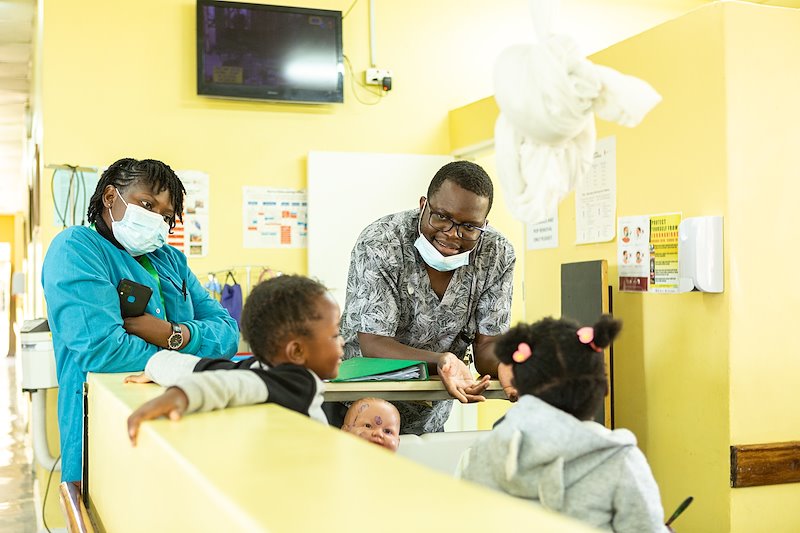 Nurses share some quality time with the kids.