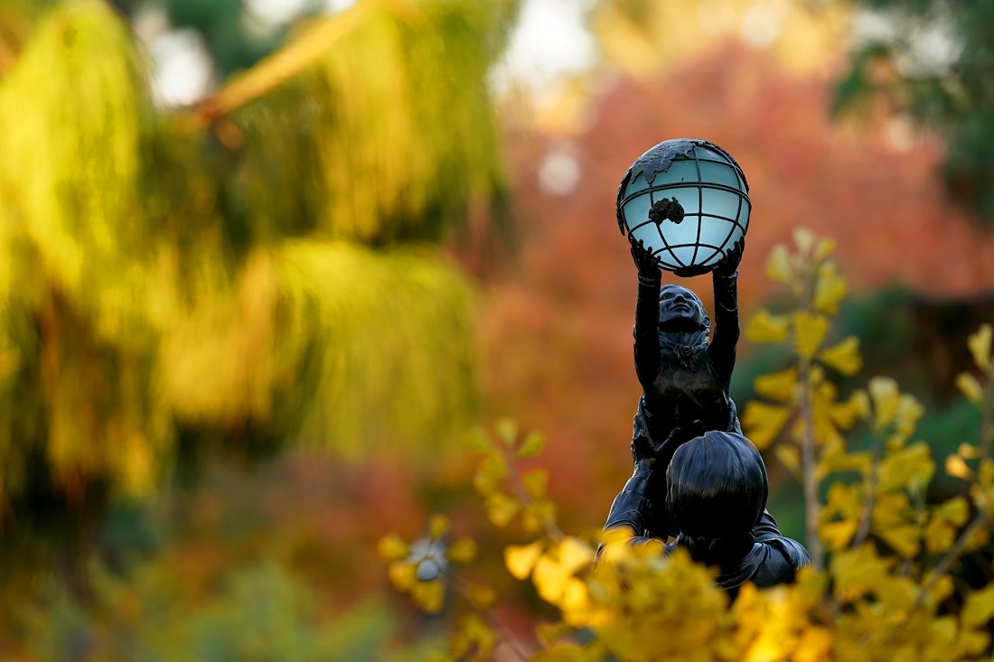 A view of the Jane Addams statue during Fall.