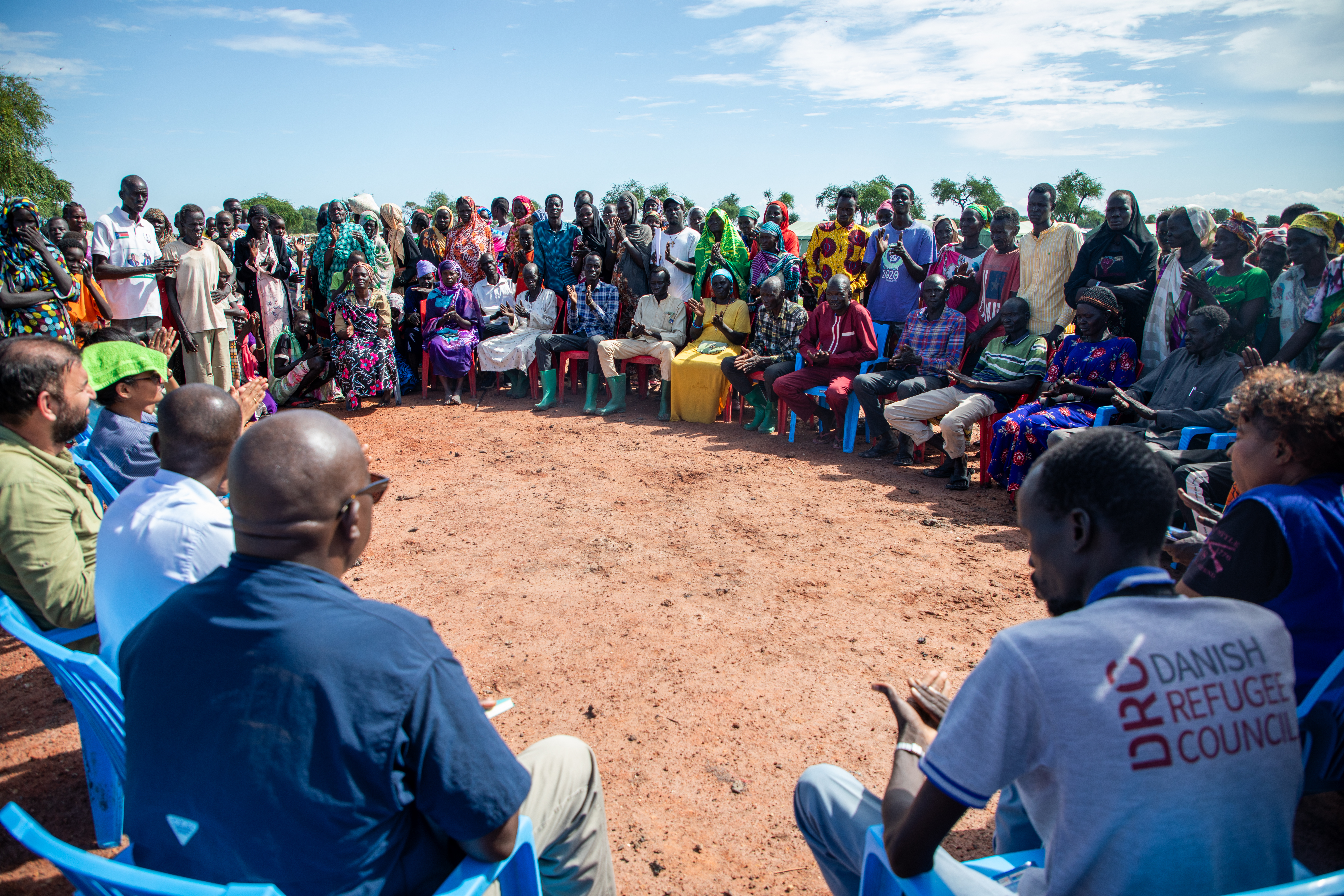 An OCHA assessment team with relocated communities in Rotriak. OCHA ...
