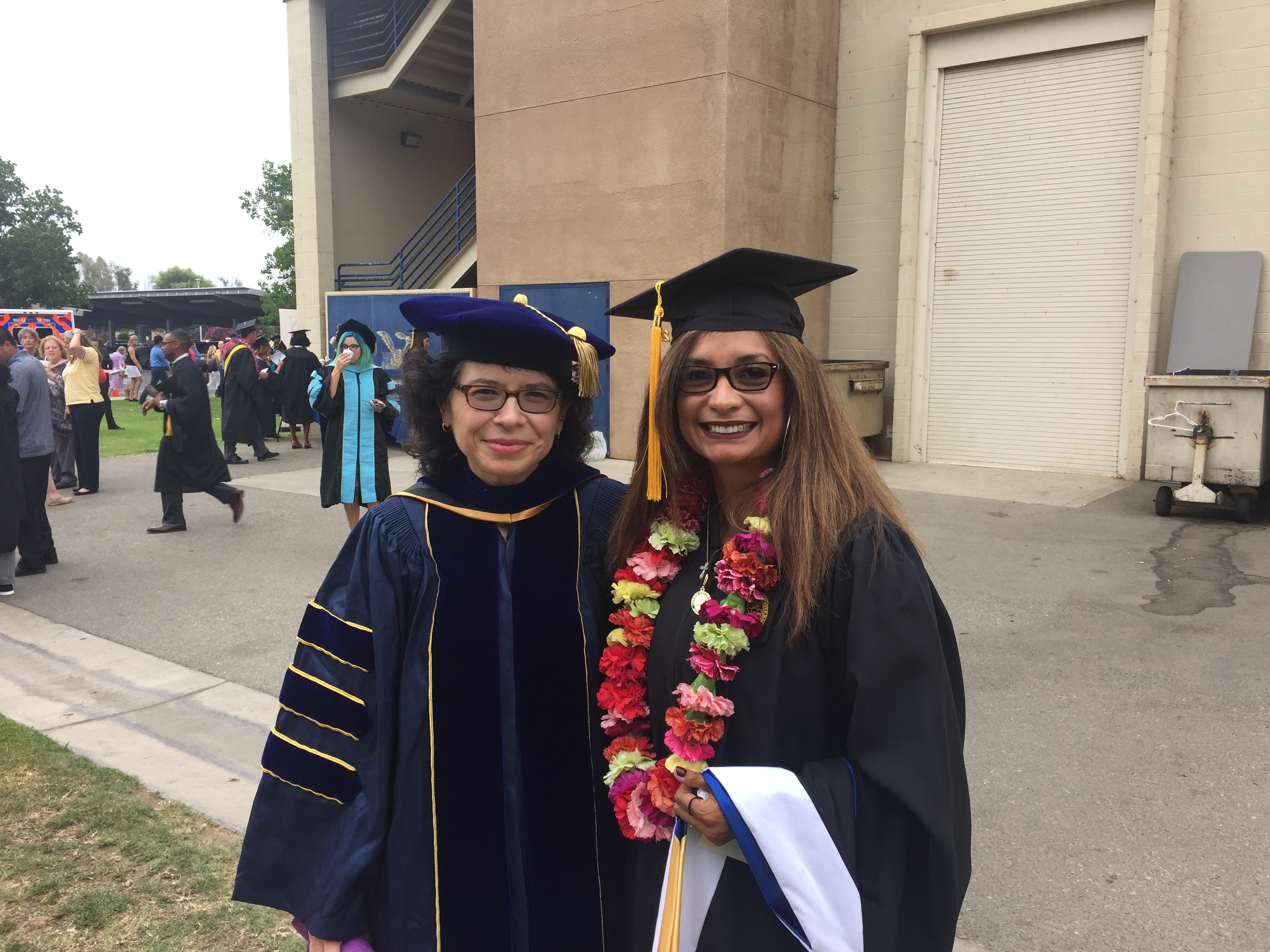 Garcia with Dean Alicia Rodriquez during CSUB commencement.