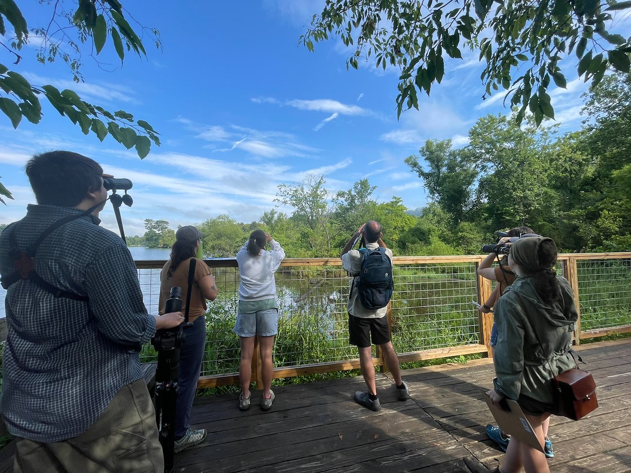 McCullough Fellows learn about Nicole Moordian's research while birding.