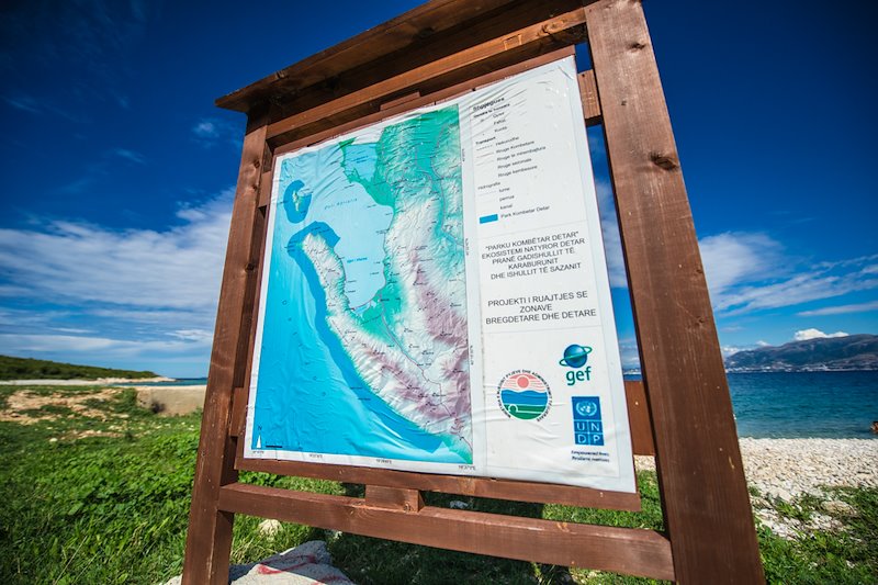 Albania 2014 Claudia Amico-information table at marine park of Karaburuni area.jpg