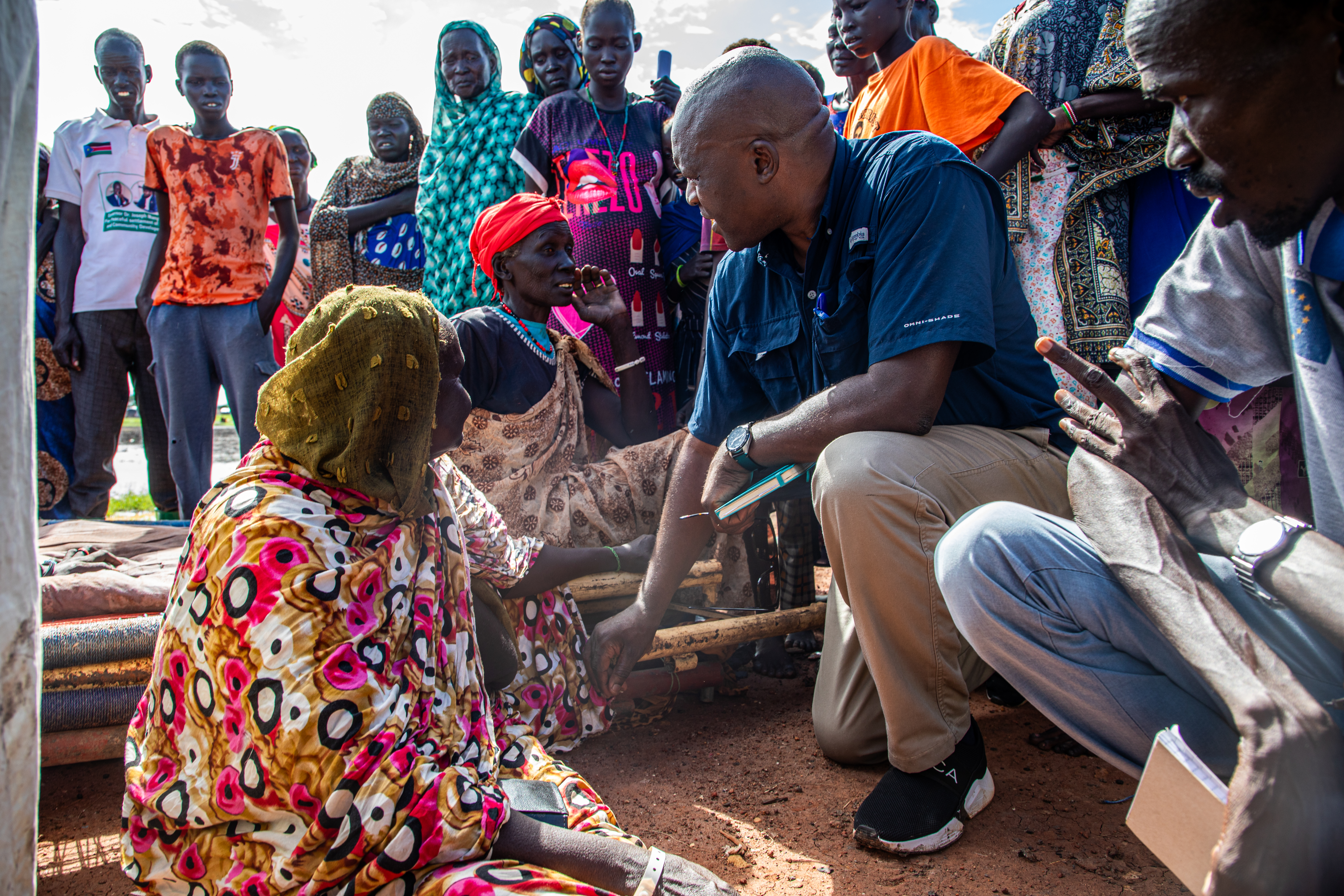 Joseph Inganji, Head of Office of OCHA South Sudan talking with a ...