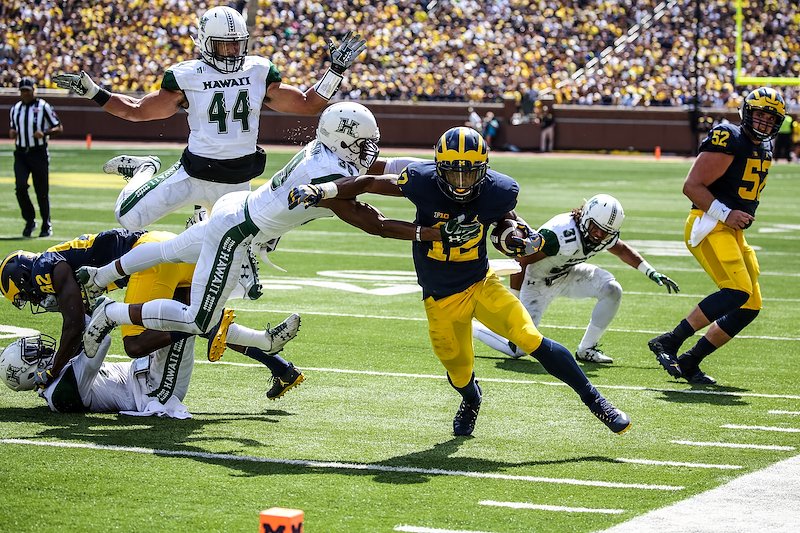 Freshman Chris Evans ran for over 100 yards in his first game at Michigan Stadium.