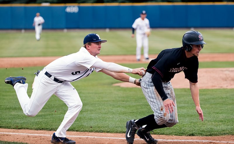 Hayden Nielsen tags out player from Santa Clara - Photo by Mark A. Philbrick/BYU