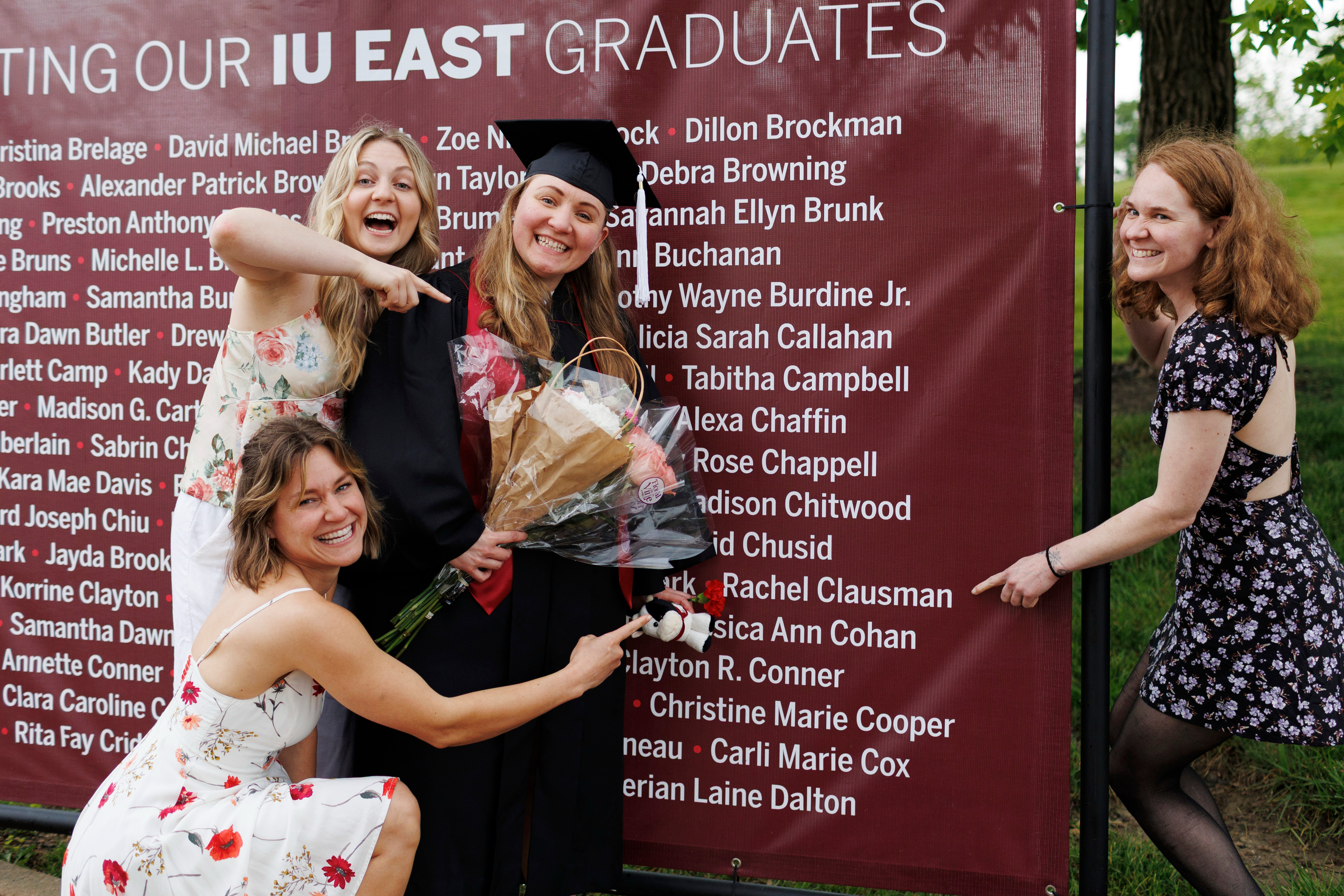 Graduate Rachel Clausman gets assistance finding her name on the ...