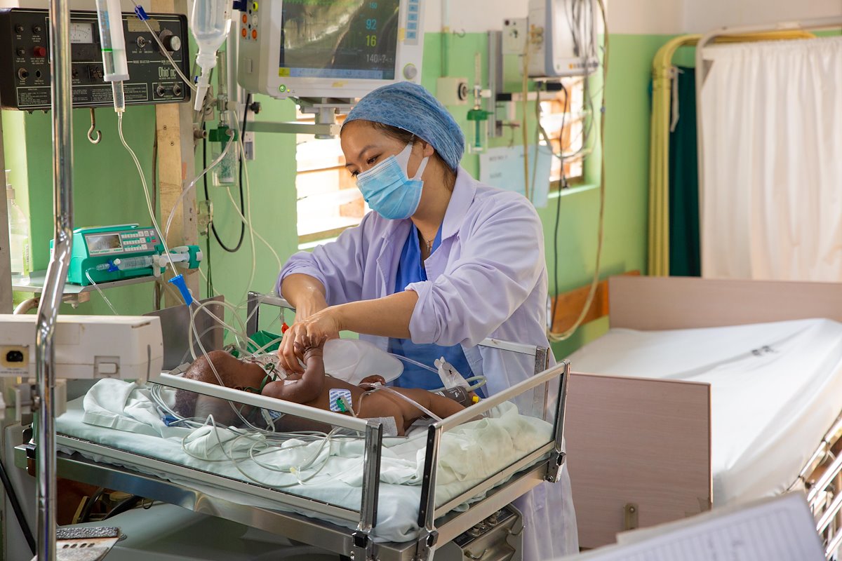Dr. Sara is attending to one of the babies in our ICU. Sara is from Mercy Ships, our partner.