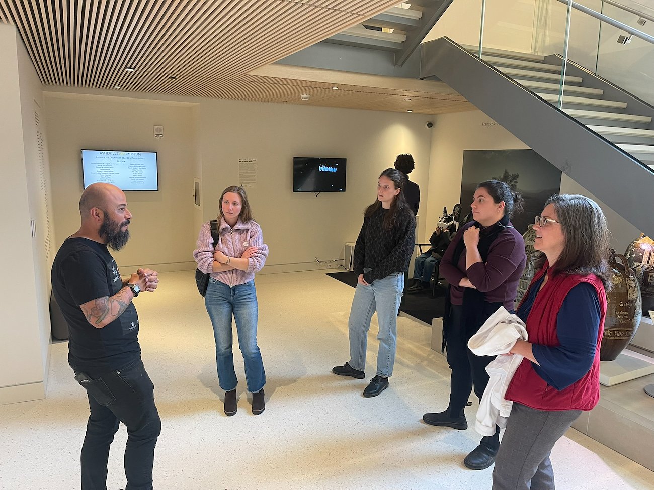 The other fellows join Edwin Salas Acosta for a day at the Asheville Art Museum.
