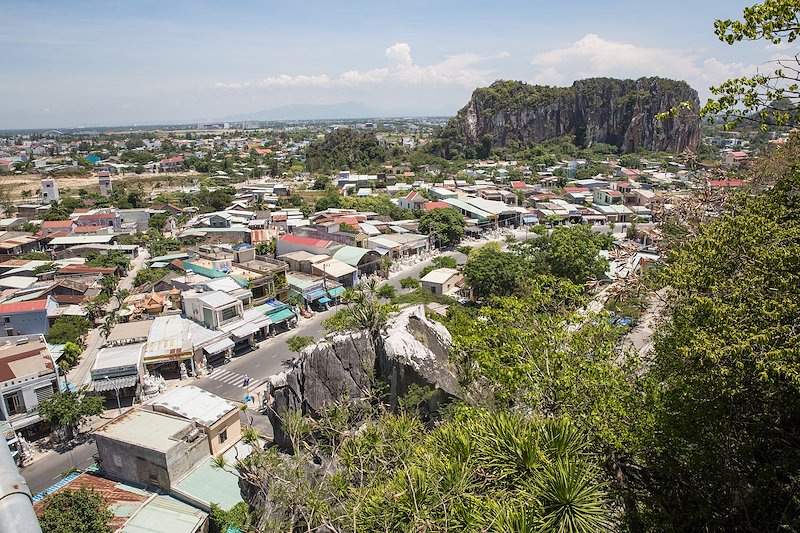 Climbing the locally-famous Marble Mountain, with a view of the myriad shops selling marble carvings below.