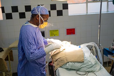 Dr. Emma prepares for surgery. We thank God for such humble servants.