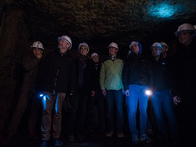 The group donned hard hats and flashlights to explore the caves.