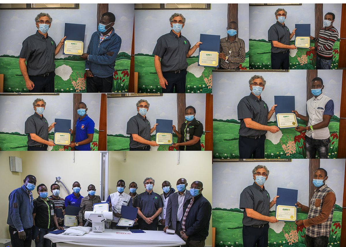 Certified BioMed trainees receive their certificates.