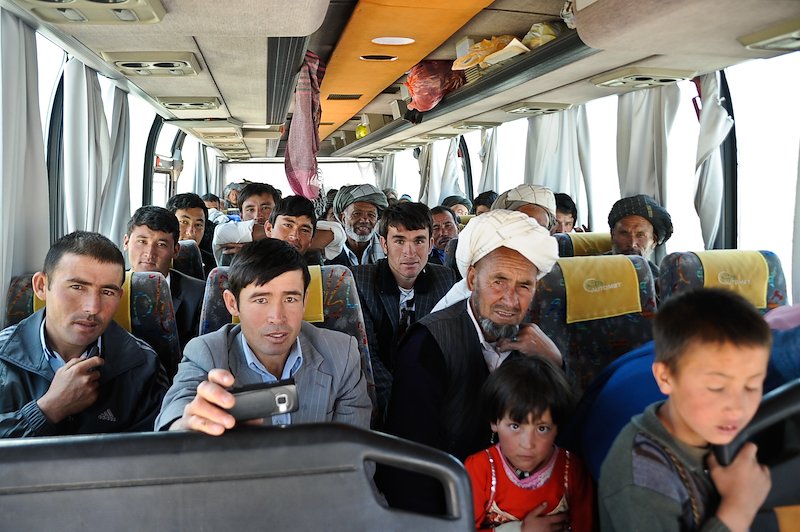 Passengers on a bus travelling on the new Bamyan to Yakowlang Road.