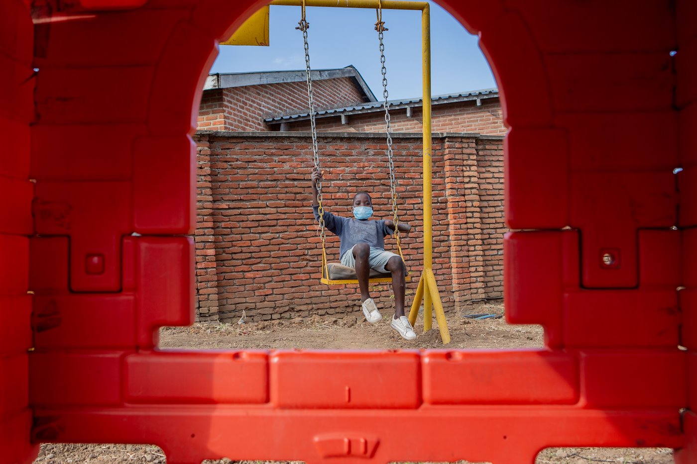 Edward out in the playground. Edward loves outdoor games and the playground is his best place!