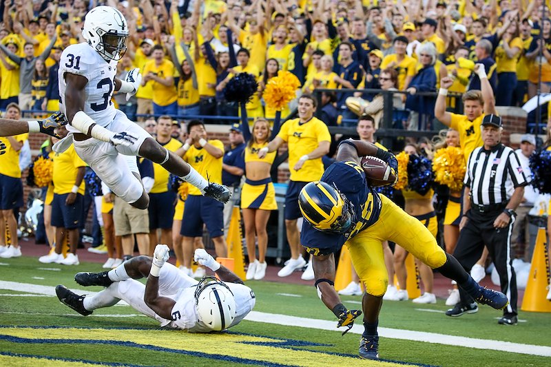 Karan Higdon rumbles into the endzone for another Michigan touchdown.
