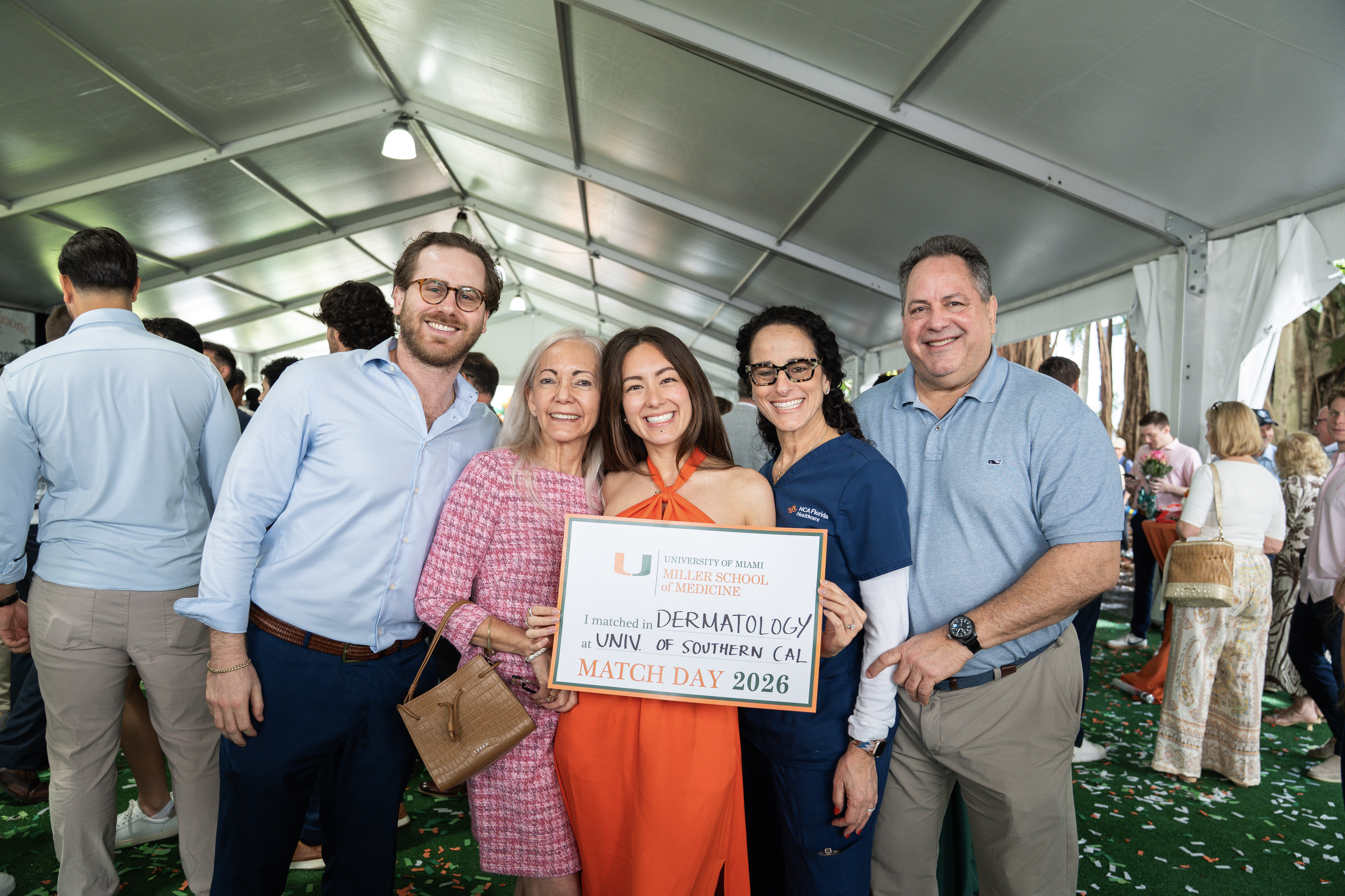 A medical student and family pose at Miller School of Medicine Match ...