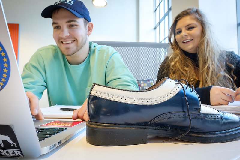 Writing a gangster story about the owner of these fancy shoes are Will Kent ('19) and Emma Kook ('18).