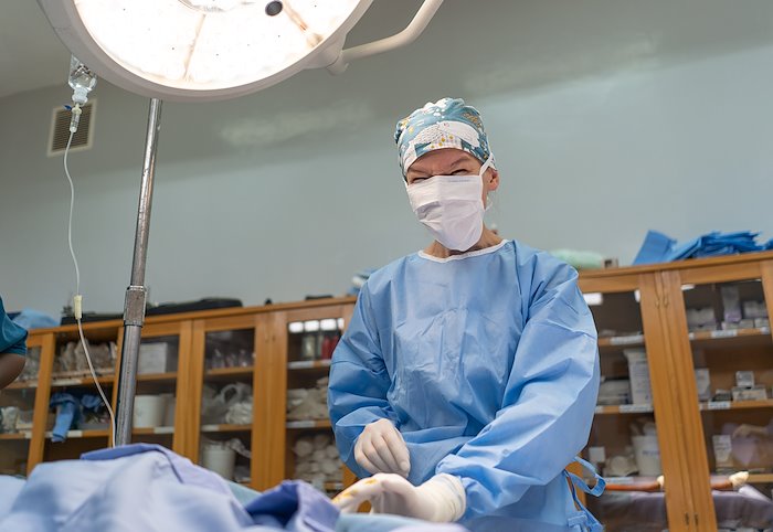 Dr. Uli prepares for surgery.