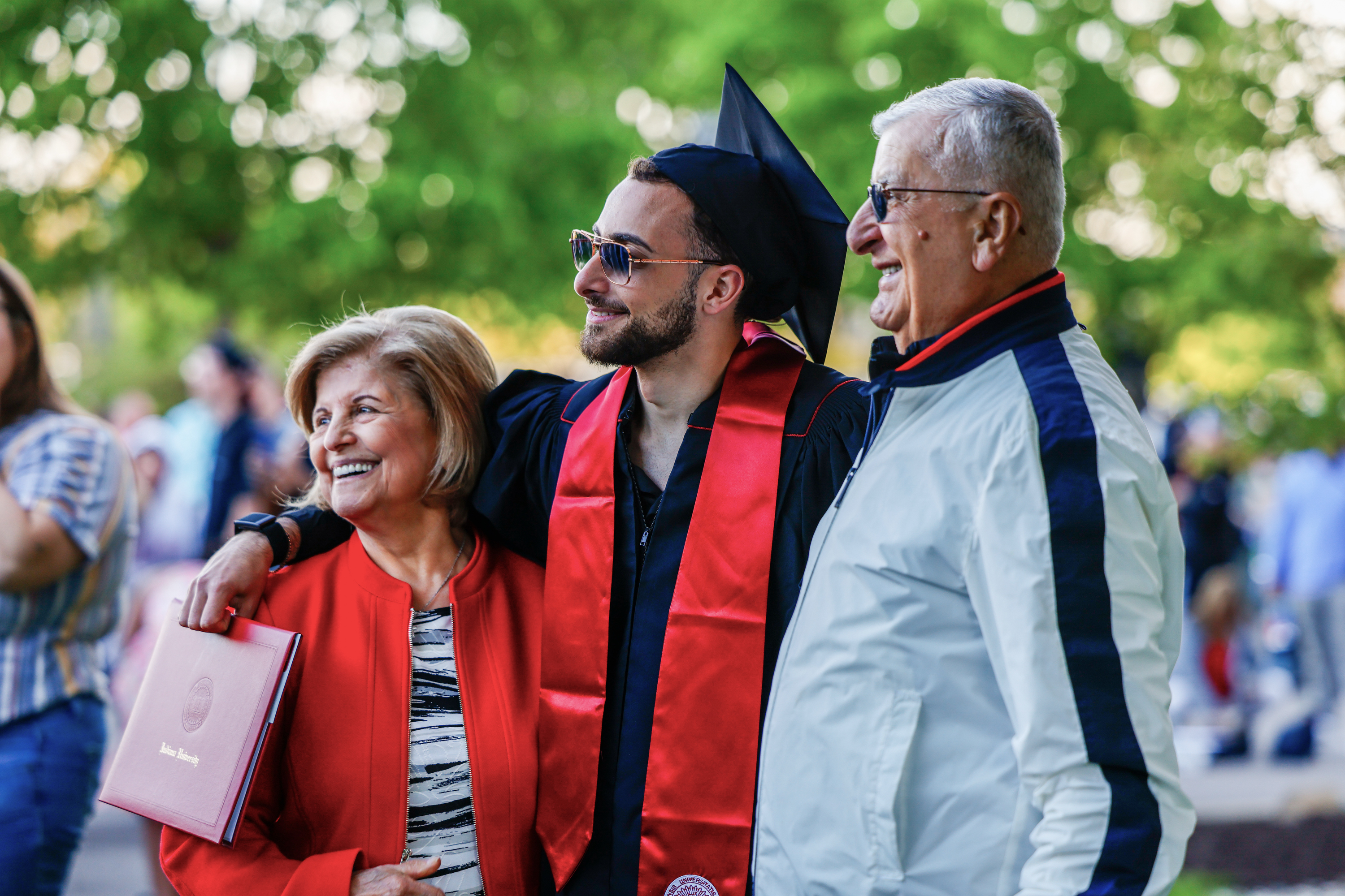 A graduate poses for photos after the IU South Bend Commencement on ...