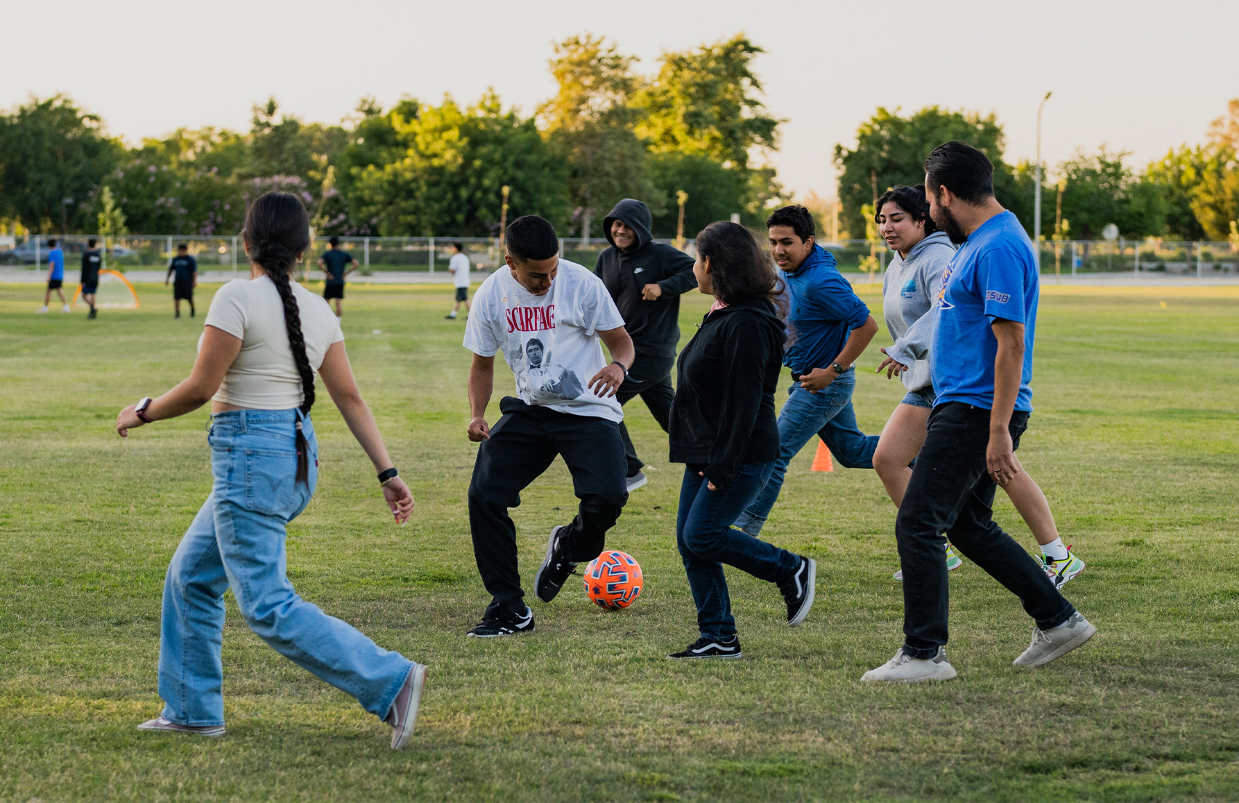 A group of Incoming freshmen play soccer on campus during the Summer ...