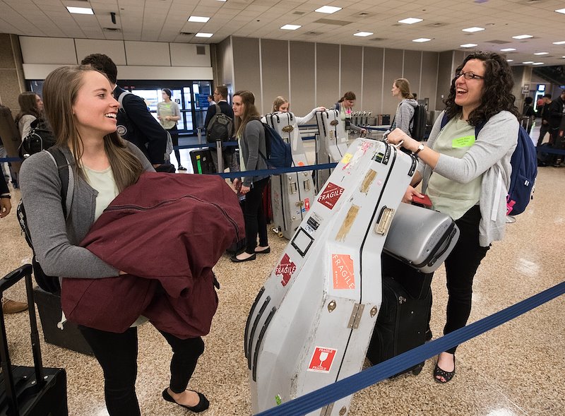Members of the BYU Chamber Orchestra arrive at the Salt Lake Airport for their flight to Manila. Photo by Jaren Wilkey/BYU