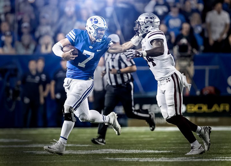 Taysom Hill runs the ball during the game against Mississippi State - Photo by Nate Edwards/BYU