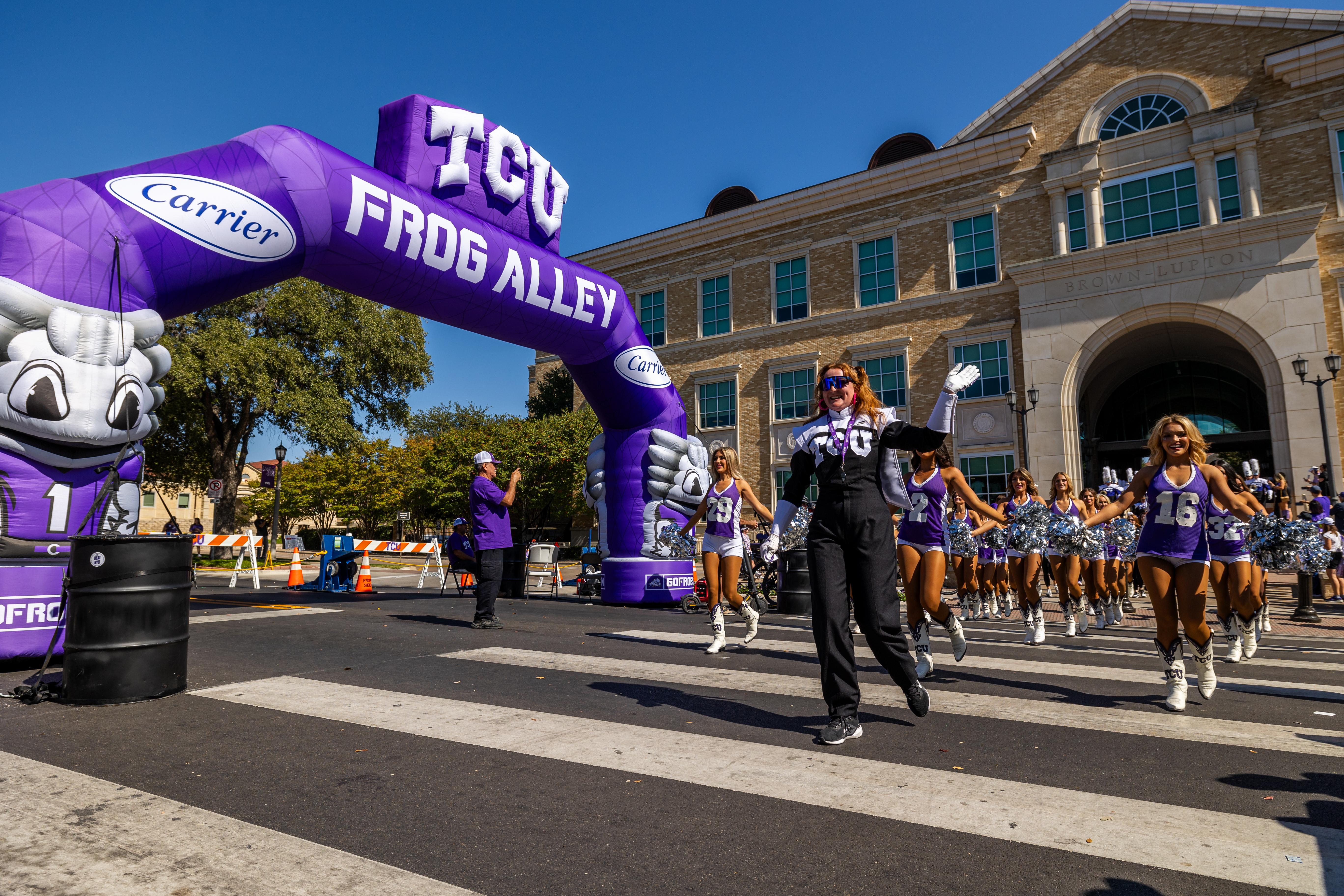 The Horned Frog Marching Band and TCU spirit groups march from the ...