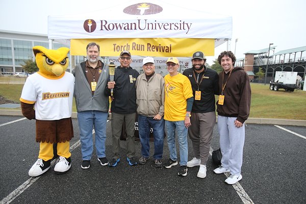 A gaggle of proud Profs enjoyed the spirit of day, including (from left)  University mascot Whoo RU , Vice President of Student Life/Dean of Students Kevin Koett, Houshmand, Oteri, Rattigan and Cardona brothers Collin and Quinn.