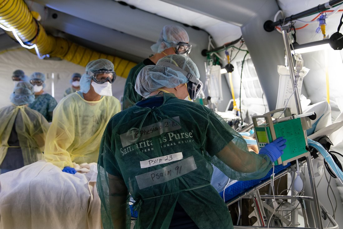 Shannon, an ICU nurse, has Bible verses written on tape securing her PPE. “I pray that patients see Jesus in us,” she said. "I have the hope of Jesus and...ultimately He’s in control of all; that is the hope that carries me through."